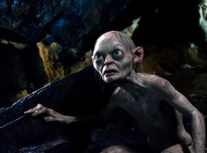 Gollum (Andy Serkis), enhanced thanks to modern technology, playing a game of riddles with Bilbo.