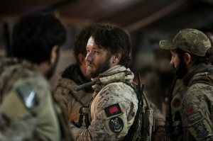 Patrick (Joel Edgerton) enjoying banter with his marine companions before leading them to into combat to kill Bin Laden.