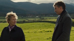 Philomena in her senior years (played by Judi Dench) talking about her past with Martin Sixsmith (Steve Coogan) in the Irish countryside.