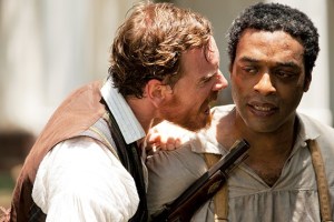 Epps (Michael Fassbender), the nastiest of all the slave owners, shouting crazily at an enslaved Solomon, tormenting him.