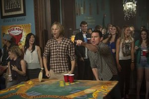 Jenko getting drunk at a party, whilst striking up a friendship with his American football team-mate, Zook (Wyatt Russell), much to Schmidt's jealousy.