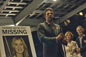 Nick appealing to the public to help him find Amy, with posters of her missing to raise awareness about the situation.
