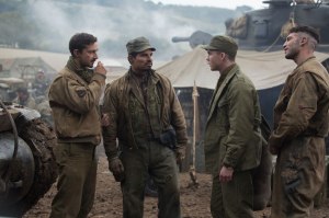 Young Norman Ellison (Logan Lerman, inside right) joining his crew of tank-men, and being derided for his inexperience by Boyd (Shia Lebeouf), 'Gordo' (Michael Peña) and 'Coon-Ass' (Jon Bernthal).