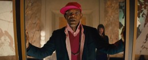 Valentine (Samuel L Jackson) looking laughably ridiculous as the utterly camp villain, wanting to start the world anew.