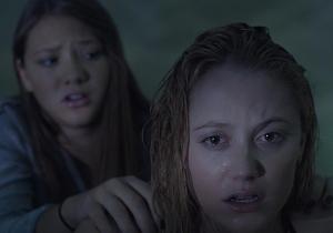 Kelly (Lili Sepe) attempting to calm Jay down upon the latter seeing a demon closing in on her.