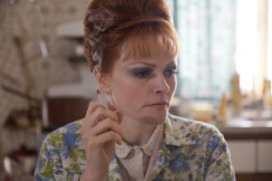Eileen (Maxine Peake) smoking. She is Lydia's hair-dresser mother who suffers from Agorophobia.