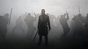 Macbeth (Michael Fassbender), bloody and filthy, in the heart of a battle.