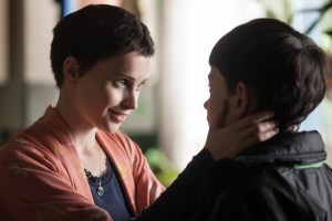 Conor with his ailing mother (Felicity Jones), who is trying to reassure Conor that she will be all right.